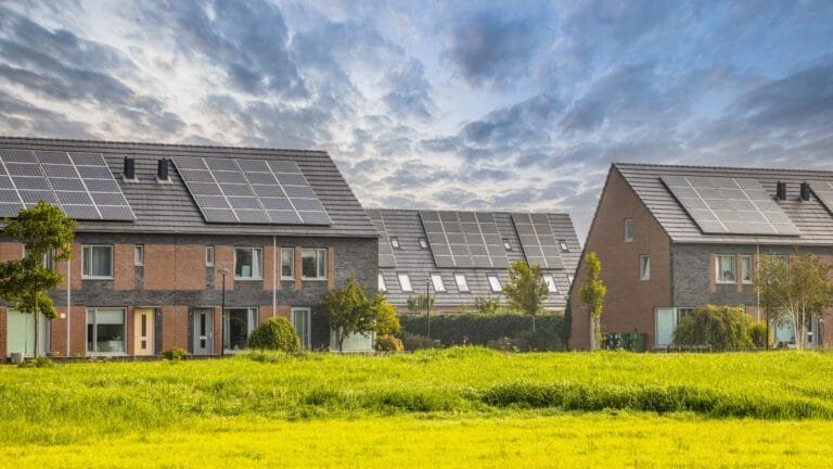 row-of-modern-houses-in-modern-eco-neighborhood-2-scaled.jpg